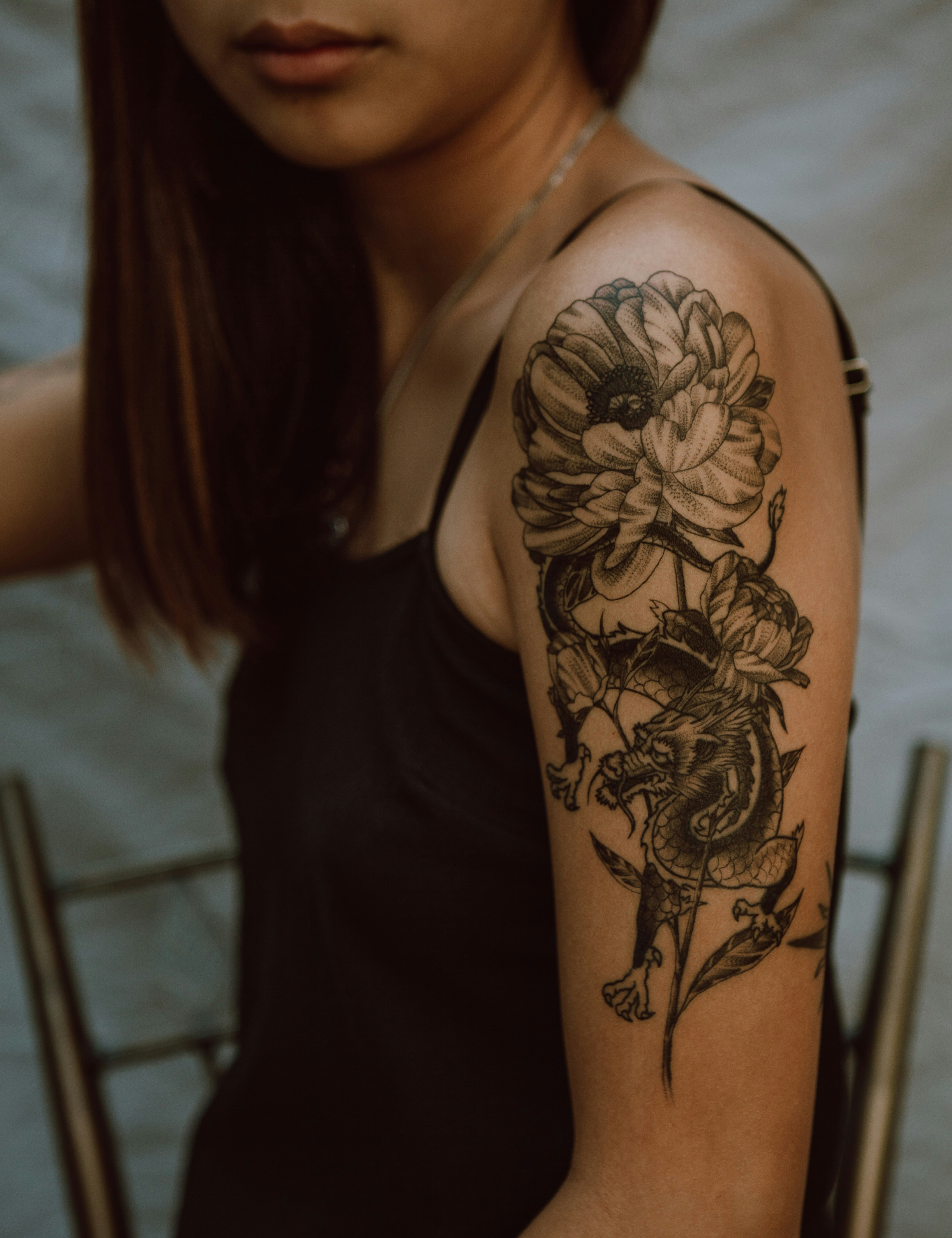 Custom blackwork botanical and floral ink piece.
