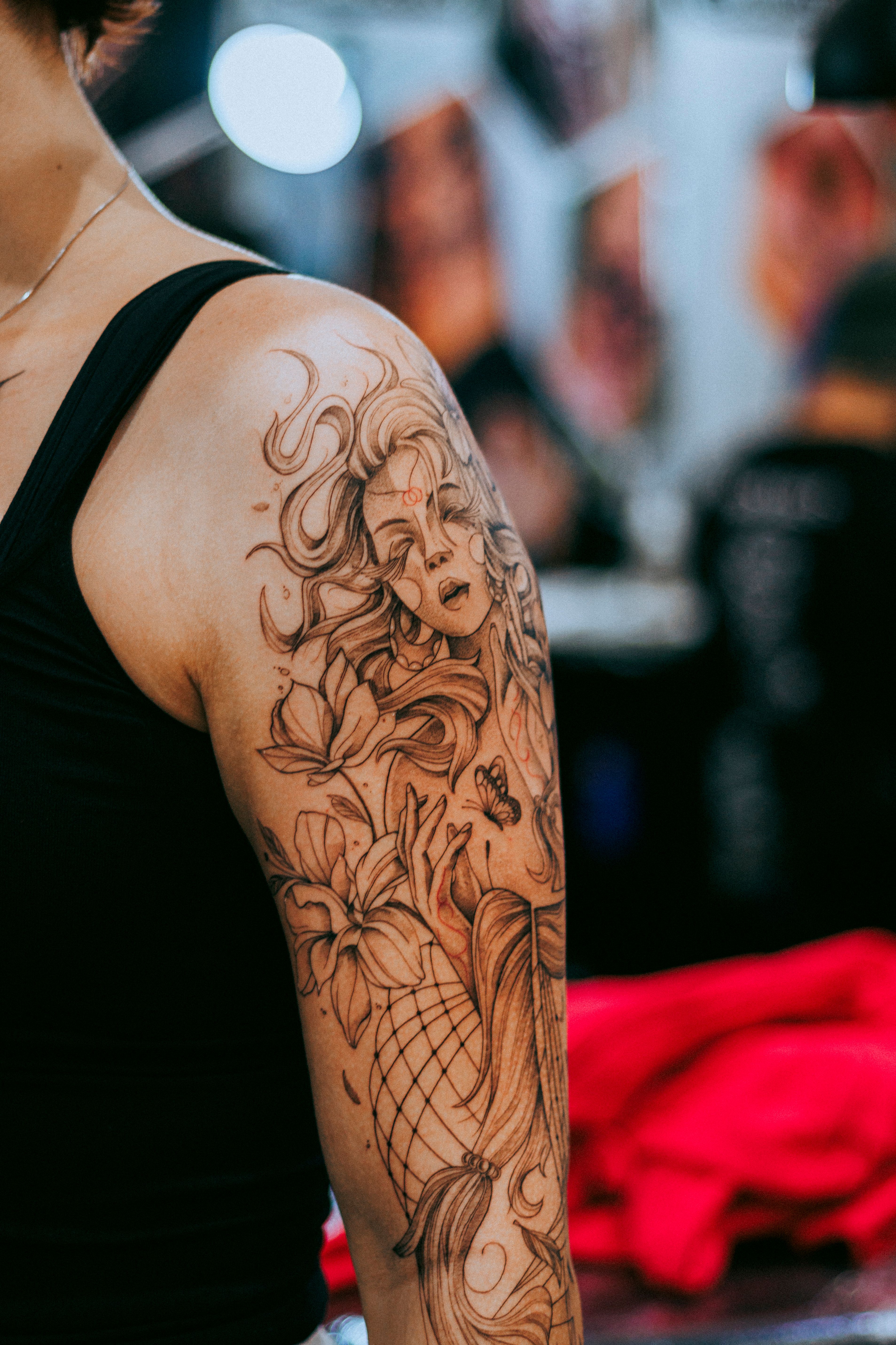 Delicate fine line ornamental tattoo work.